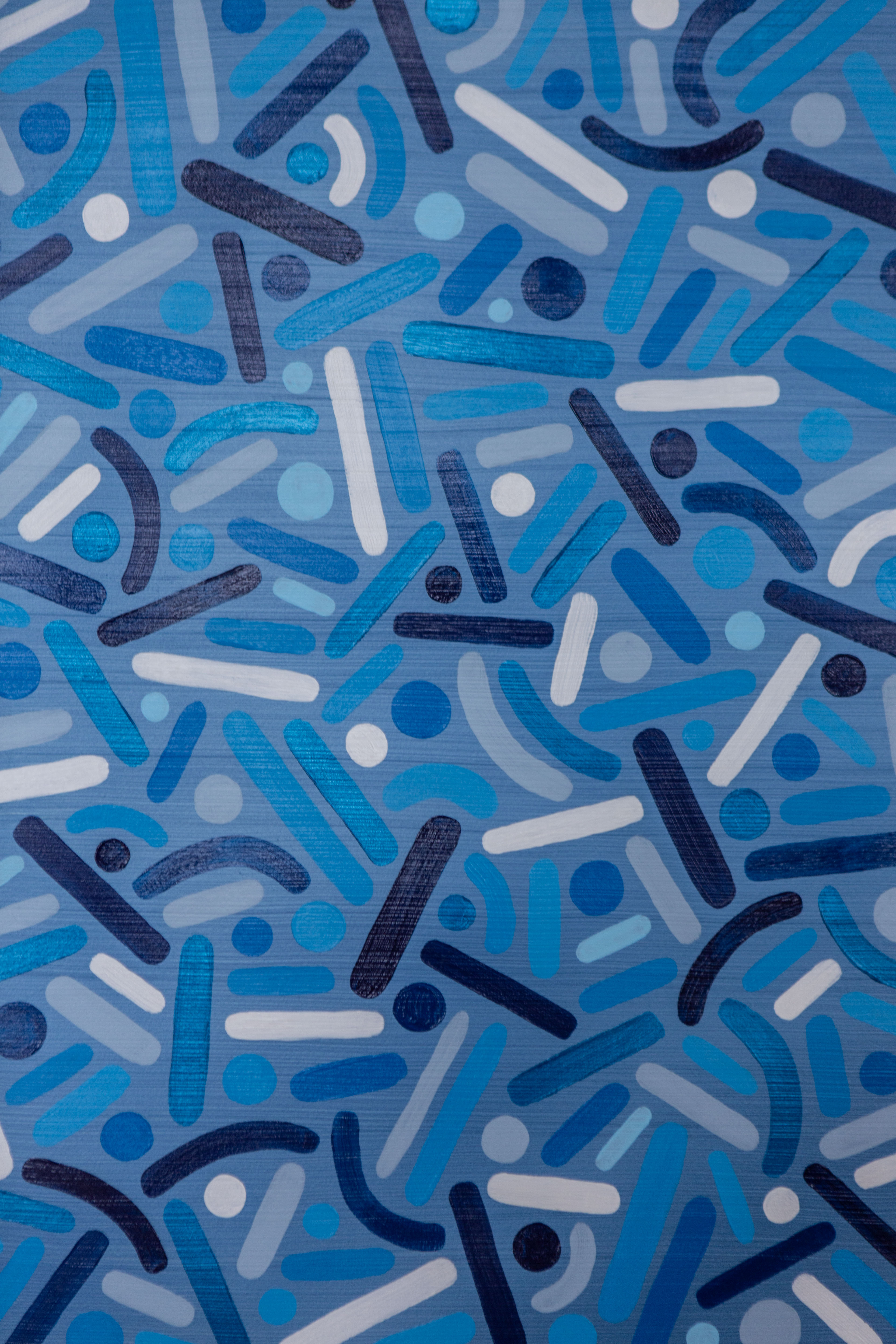 Ocean Frequency: Close-up of overlapping dark-blue, turquoise, and white dots and curves.