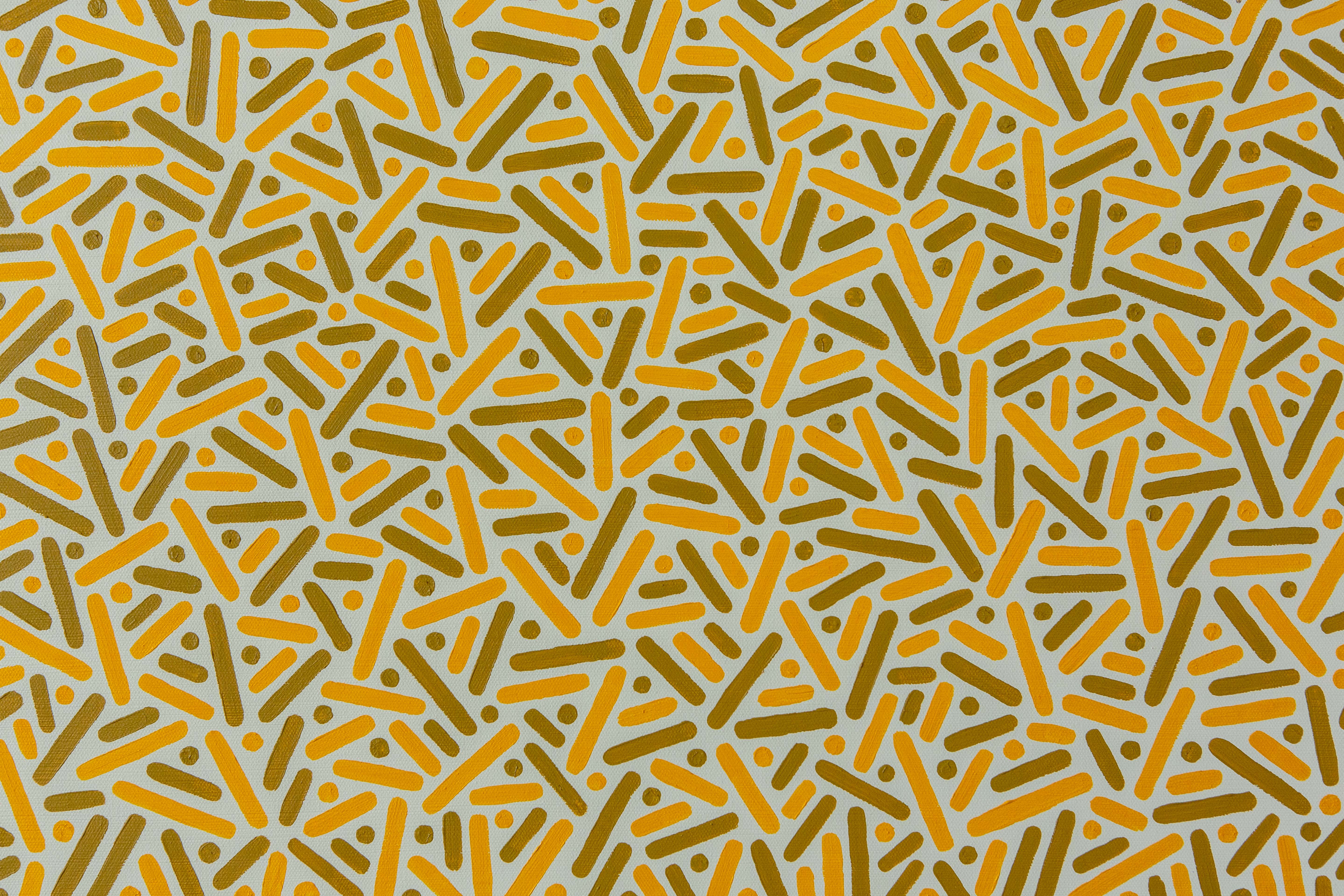 Sunlit Dunes: Close-up of golden and pale dots and straight lines packed in changing diagonal directions.