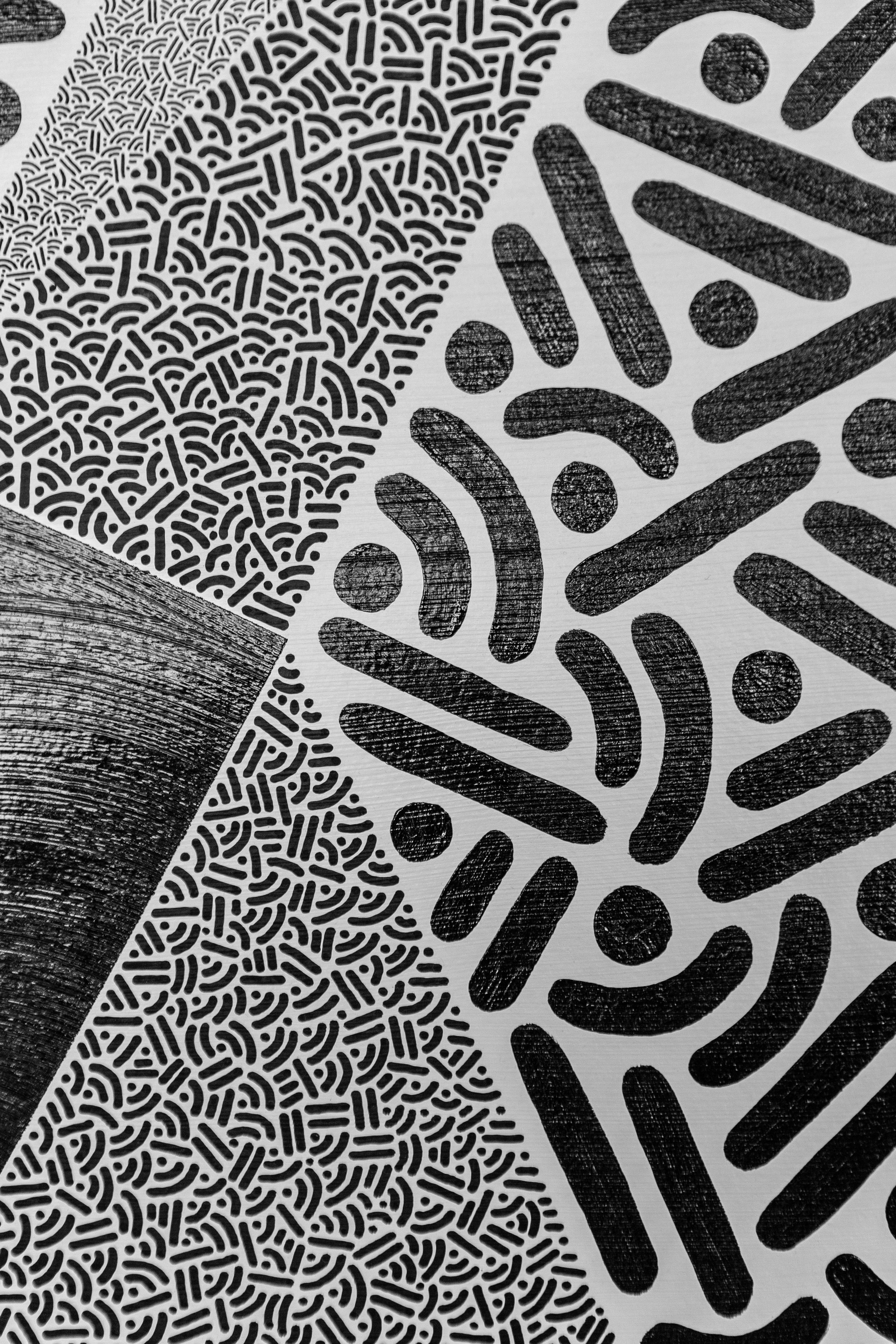 Singularity: Detail of gray triangles and black dots and curves, with fine patterned marks between the larger shapes.