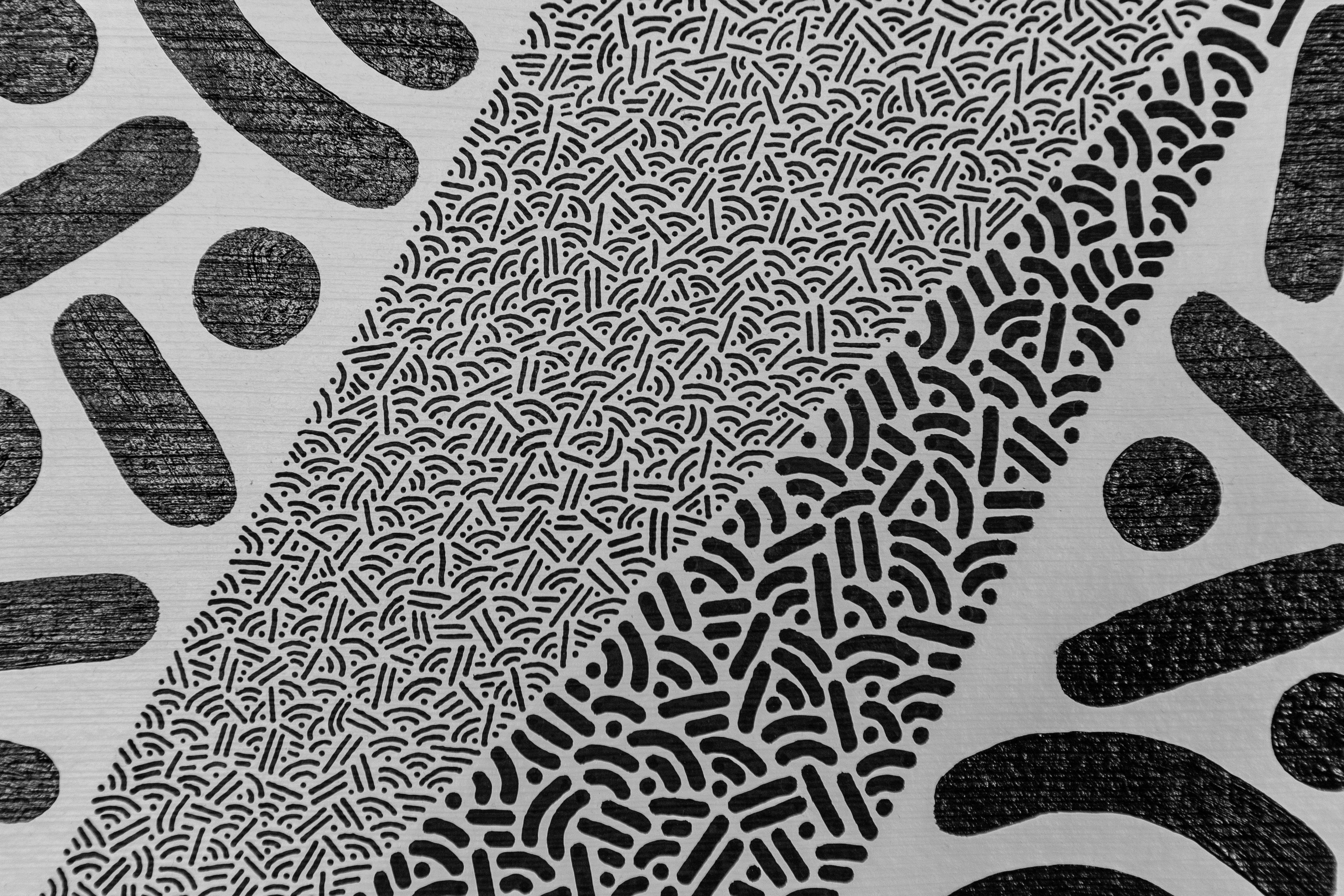 Singularity: Detail of gray triangles and black dots and curves, with fine patterned marks between the larger shapes.